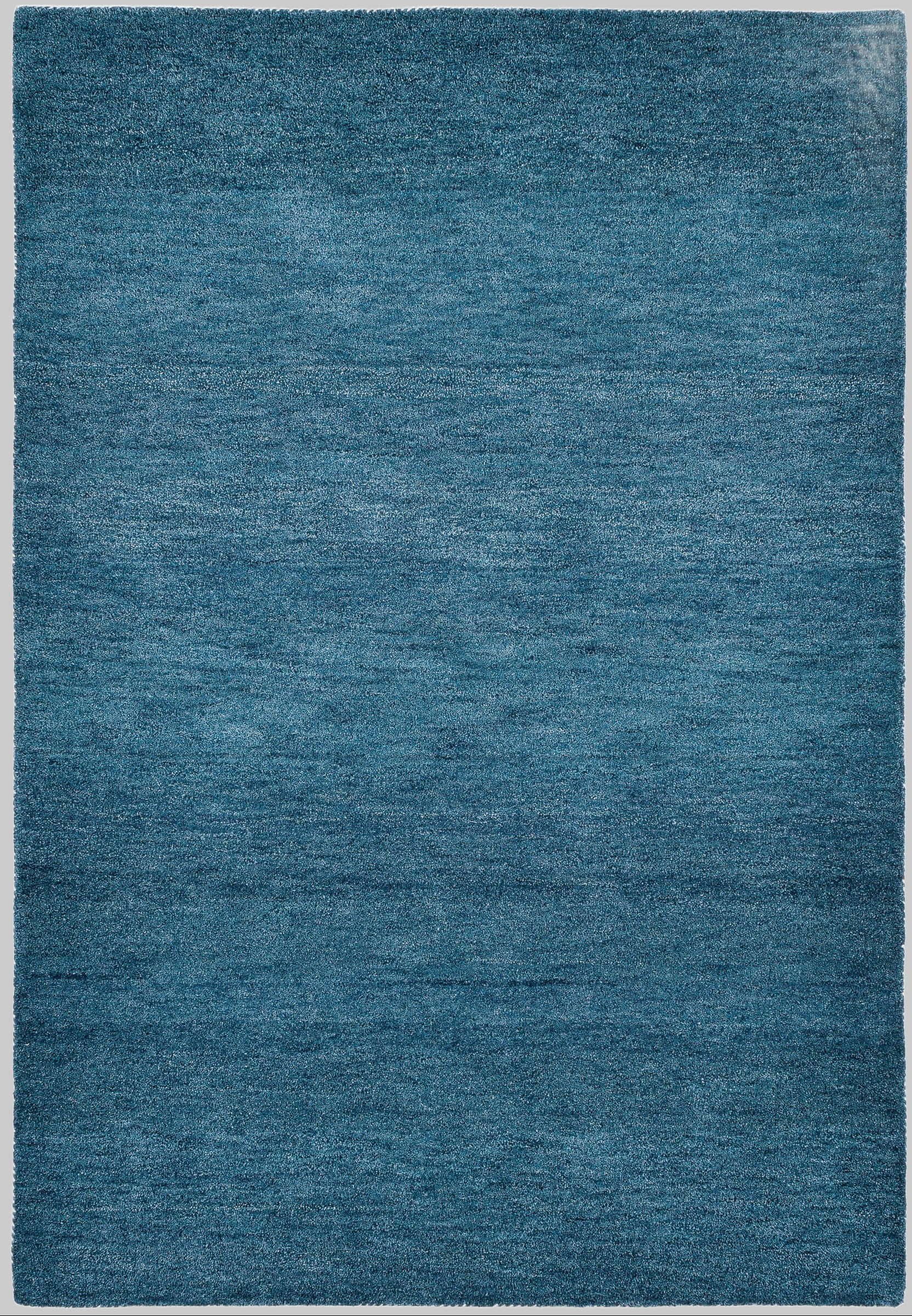 THEKO Gabbeh Uni Wollteppich | Handgewebt aus reiner Schurwolle | 14 mm Florhöhe | Rechteckig/Rund | Wohnzimmerteppich, Läufer | Nomaden-Design mit lebendiger Farbmelierung grau-blau THEKO Teppiche